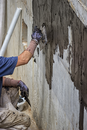 Exterior basement wall waterproofing