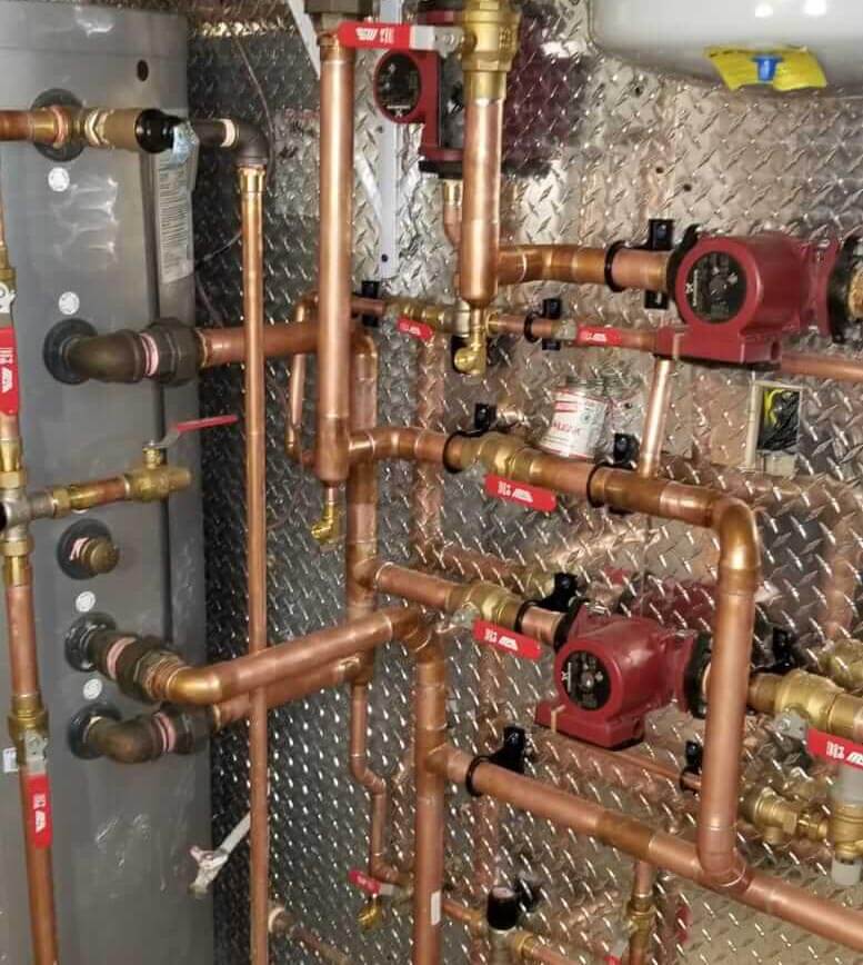 many uninsulated copper pipes