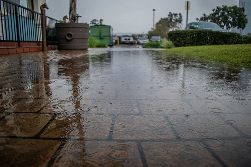 rain water pooling around homes foundation