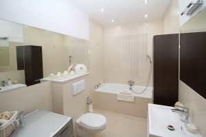 residential bathroom with slow draining toilet