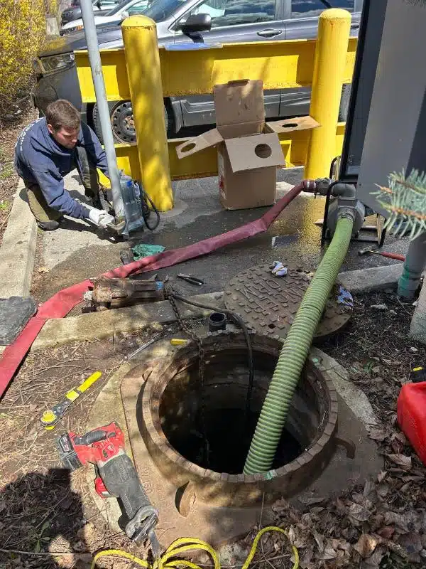cleaning and replacing the pump in a commercial catch basin