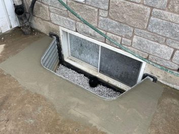 Window well installation drain repair