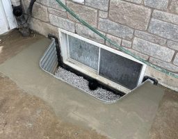 Window well installation drain repair